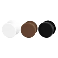 Drei Kaos Softwear Hollow Plugs aus Silikon in Schwarz, Weiß und Braun auf weißem Hintergrund