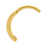 Clicker in titanio dorato per ombelico su sfondo bianco